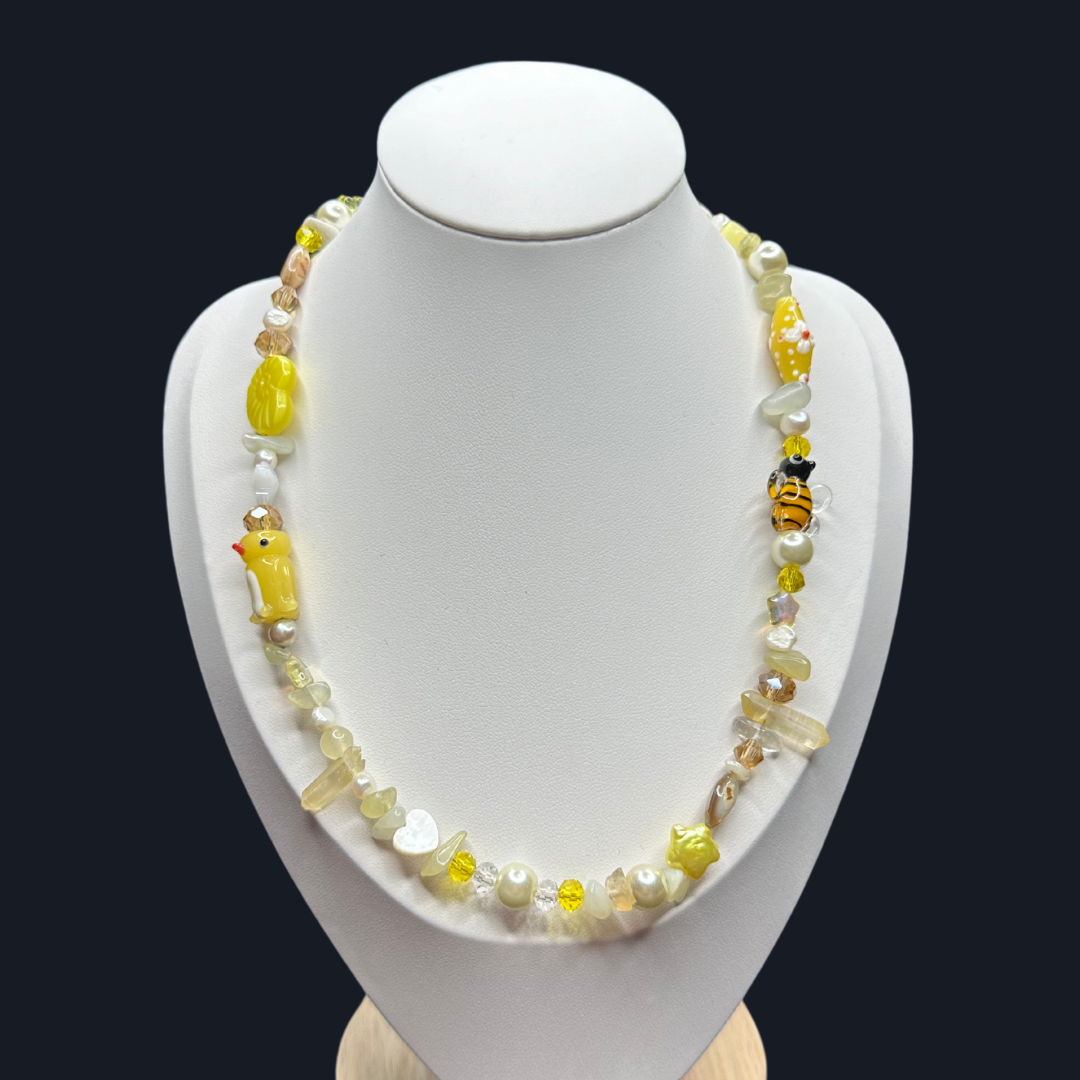 1 of 1: yellow pearl necklace